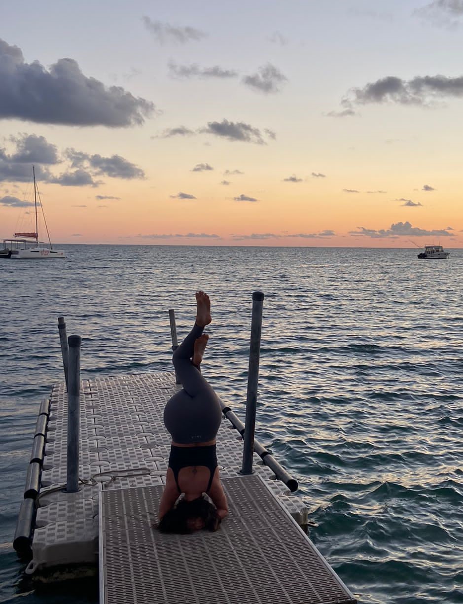 Holly doing a headstand in Mauritius